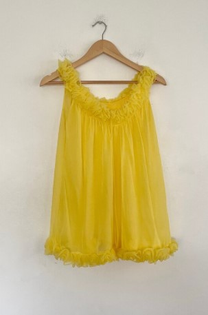 1970s Sheer Yellow Babydoll Dress from SkunkCityVintage on Etsy